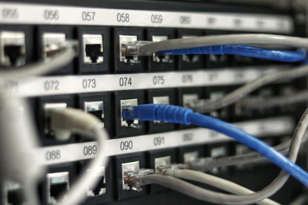 Network router with indicator lights in a dark room