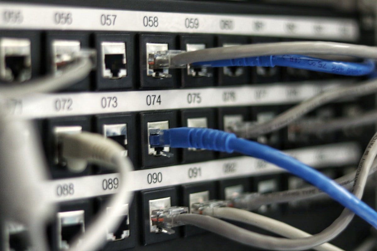 Network router with indicator lights in a dark room